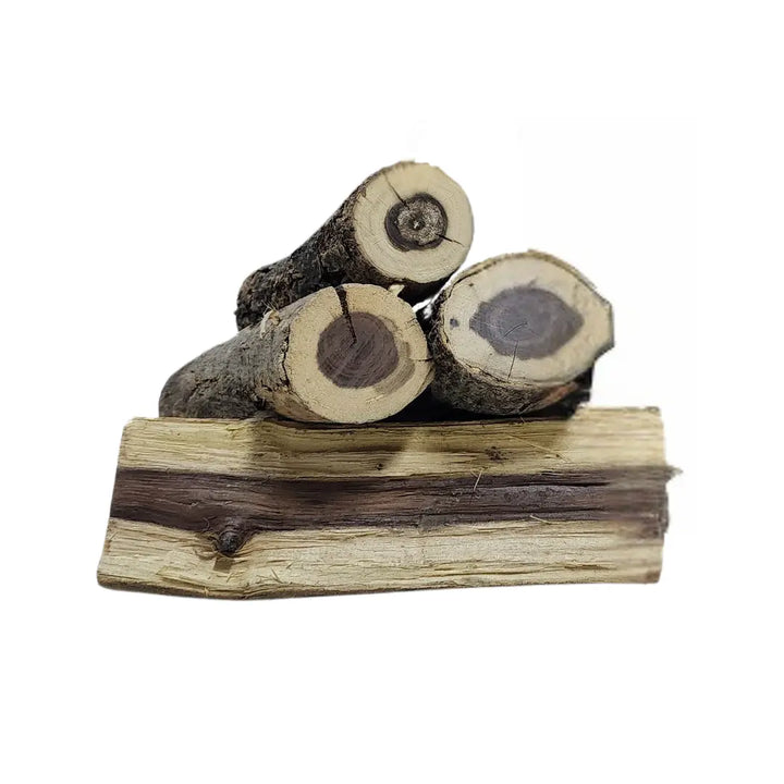 Cubanar Saman Hardwood logs showcasing their natural texture and durability, perfect for fireplaces and outdoor fires