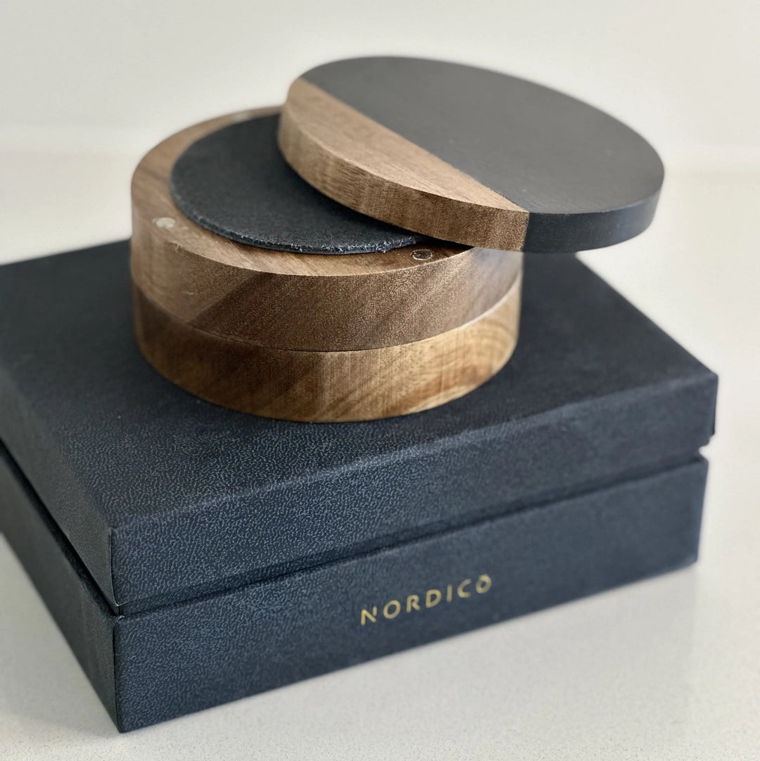 Nordico knife sharpener with whetstone and leather strop in a magnetic acacia wooden box.
