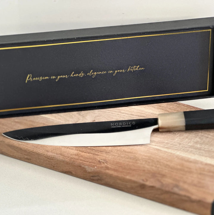 Nordico VG10 Chef Knife in its premium black gift box with golden accents, perfect for gifting.
