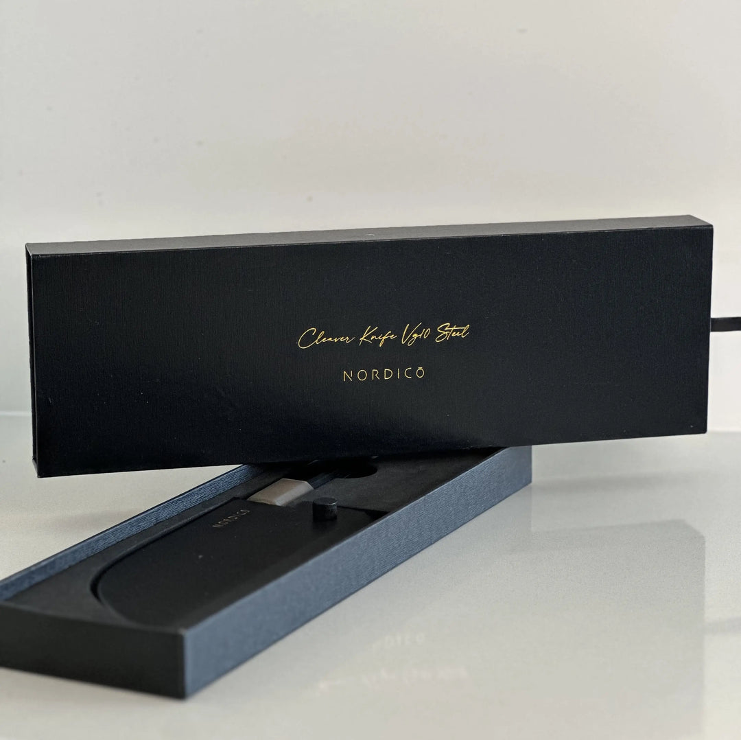 Premium packaging of the Nordico VG10 cleaver knife, a luxury gift with black and gold detailing.