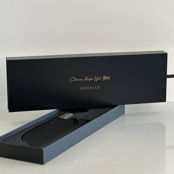 Premium packaging of the Nordico VG10 cleaver knife, a luxury gift with black and gold detailing.