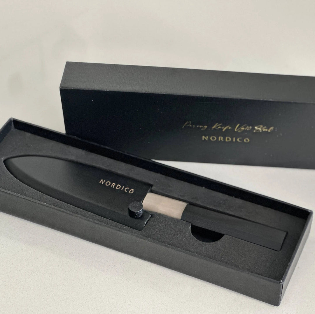 Nordico VG10 Paring Knife in its elegant black gift box with a fitted wooden sheath for stylish and safe storage.
