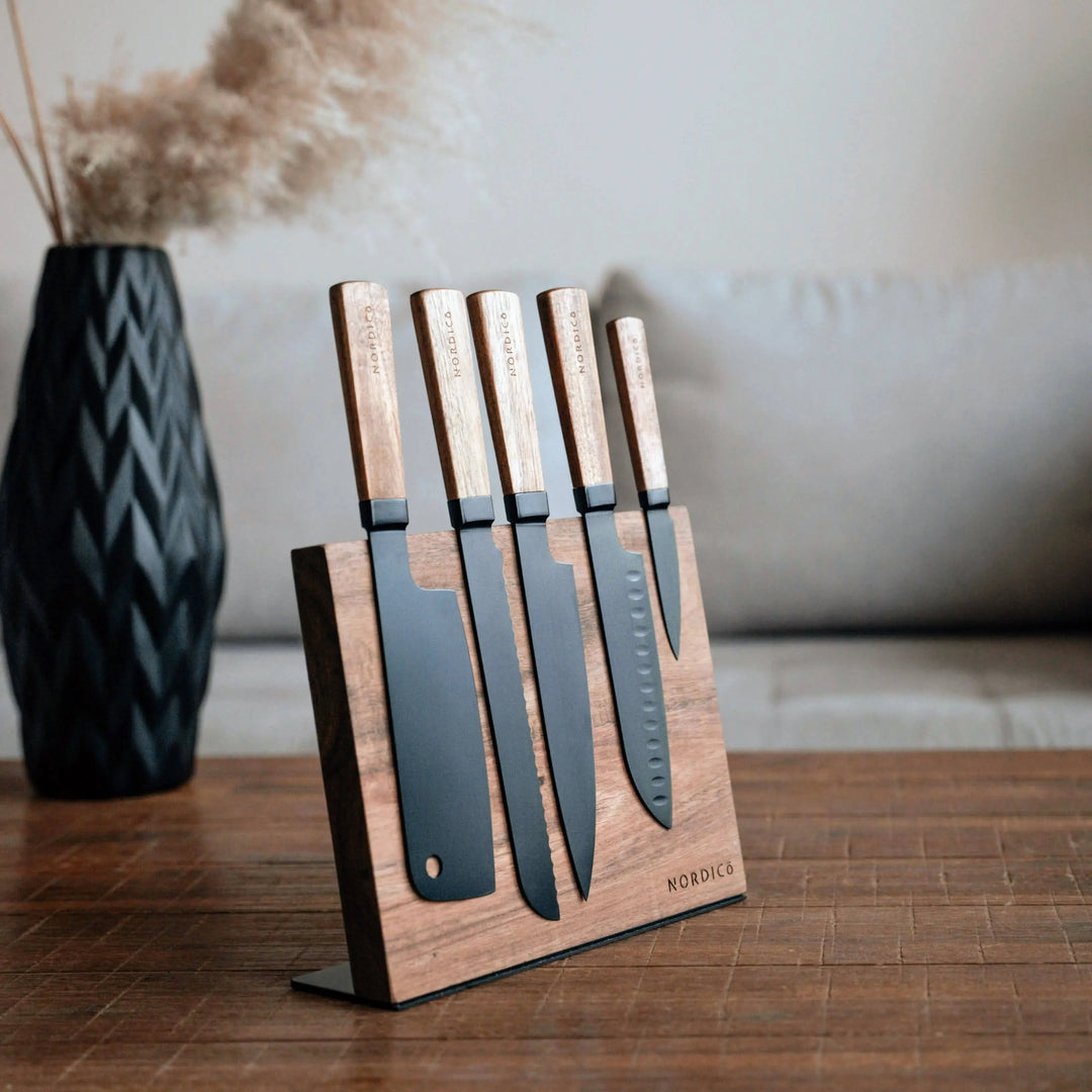 Nordico magnetic knife block displayed with a set of luxury kitchen knives, modern kitchen decor.