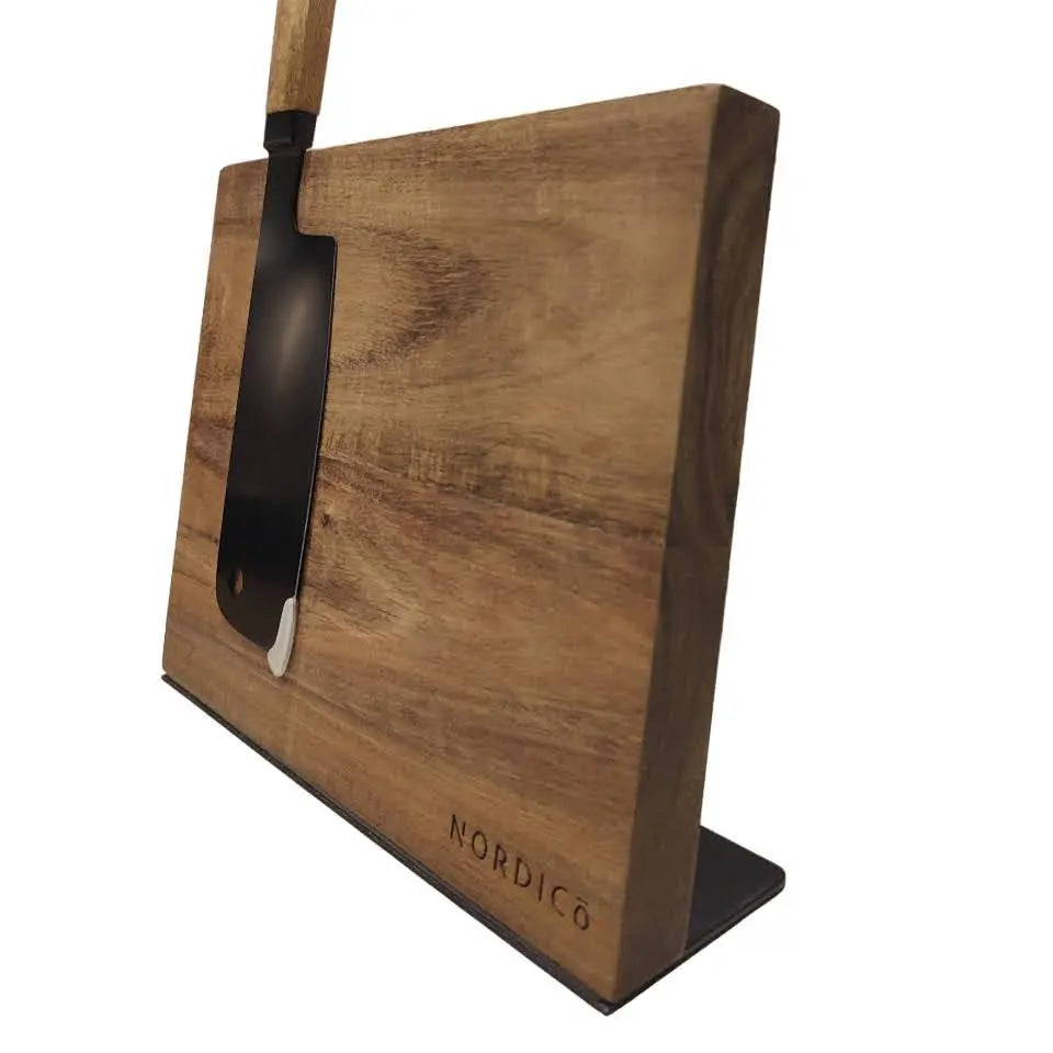 Side angle of the Nordico wooden magnetic knife block holding a knife securely with strong magnets.